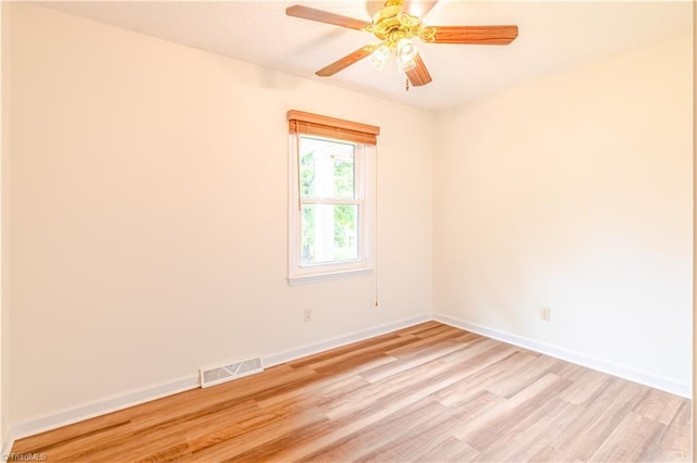 163 Ruth Ct, Winston-Salem, NC 27127 - unfurnished room featuring light wood-style flooring, baseboards, and a ceiling fan