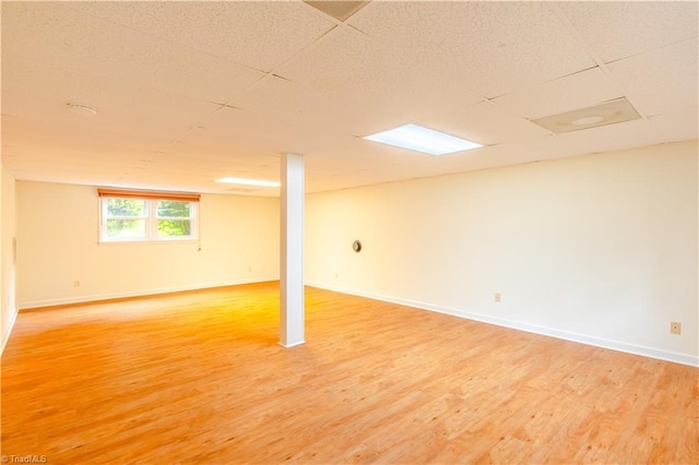 163 Ruth Ct, Winston-Salem, NC 27127 - below grade area with light wood-type flooring and baseboards