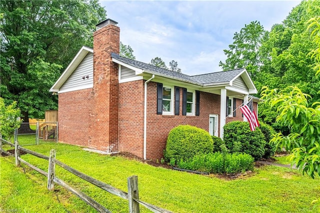 163 Ruth Ct, Winston-Salem, NC 27127 - view of home's exterior with brick siding, a chimney, and a shingled roof
