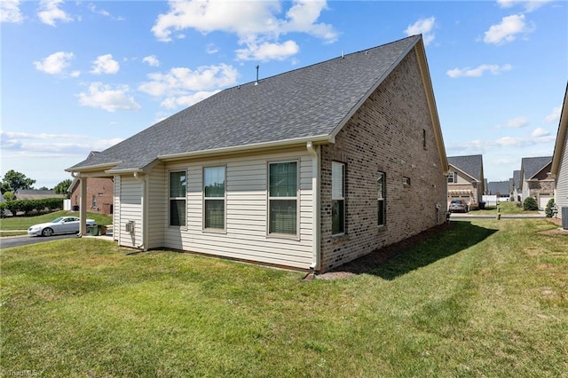 view of property exterior featuring a lawn