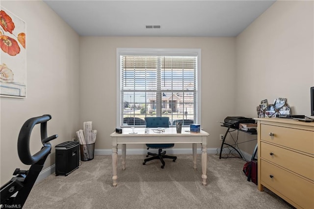 office space with light carpet