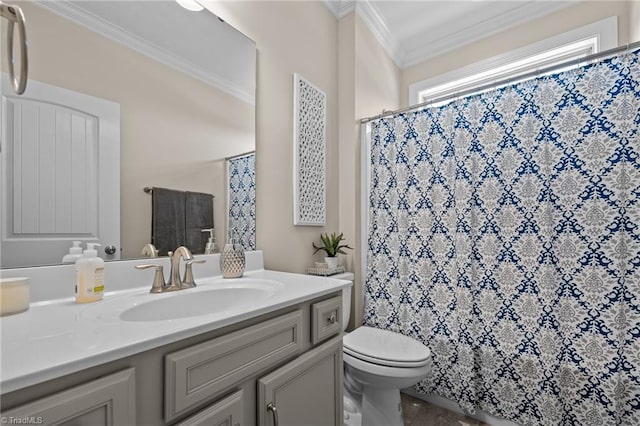 bathroom with ornamental molding, vanity, toilet, and a shower with shower curtain