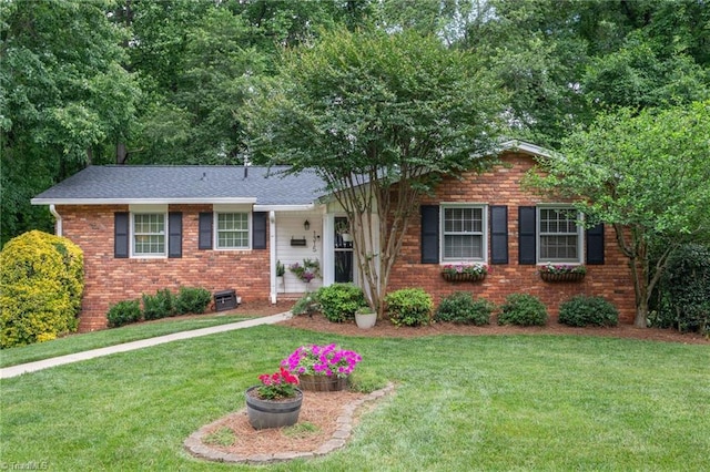 1315 Waybridge Ln, Winston-Salem, NC 27103 - ranch-style home featuring a front lawn and brick siding