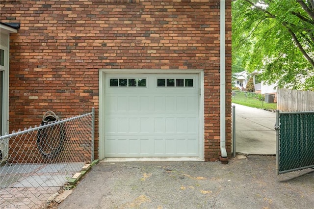 1315 Waybridge Ln, Winston-Salem, NC 27103 - garage featuring asphalt driveway