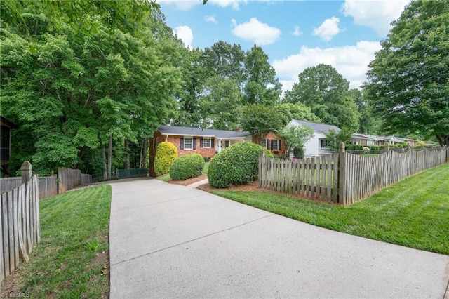 1315 Waybridge Ln, Winston-Salem, NC 27103 - view of front facade featuring concrete driveway and brick siding