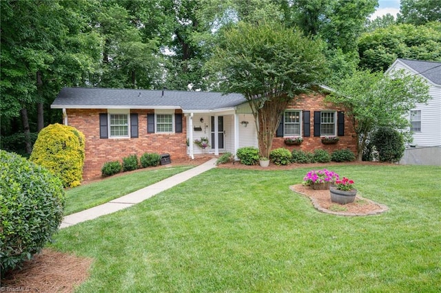 1315 Waybridge Ln, Winston-Salem, NC 27103 - ranch-style home featuring brick siding and a front yard
