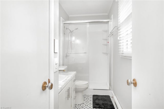 1315 Waybridge Ln, Winston-Salem, NC 27103 - bathroom featuring vanity, a shower stall, ornamental molding, baseboard heating, and tile patterned flooring