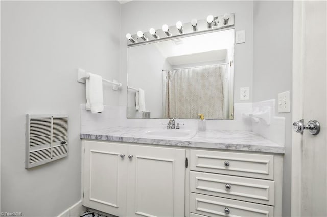 1315 Waybridge Ln, Winston-Salem, NC 27103 - bathroom featuring heating unit and vanity