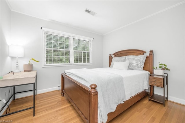 1315 Waybridge Ln, Winston-Salem, NC 27103 - bedroom featuring ornamental molding and wood finished floors