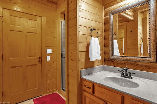 2235 Buck Mountain Rd, Purlear, NC 28665 - full bath with vanity, wooden walls, a shower stall, and tile patterned flooring