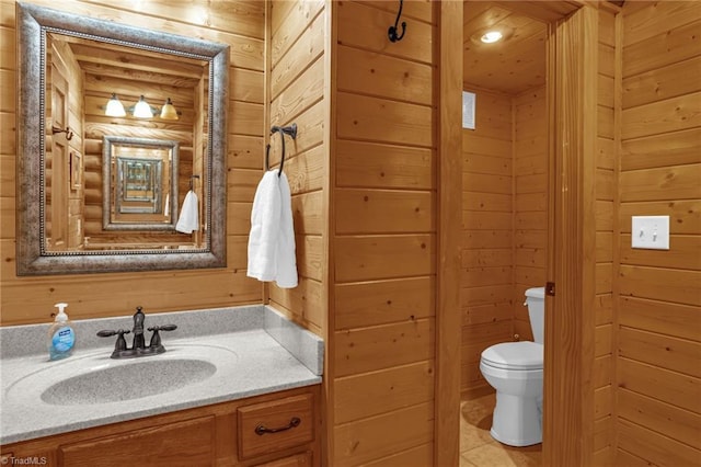 2235 Buck Mountain Rd, Purlear, NC 28665 - bathroom featuring vanity, wooden walls, and tile patterned floors