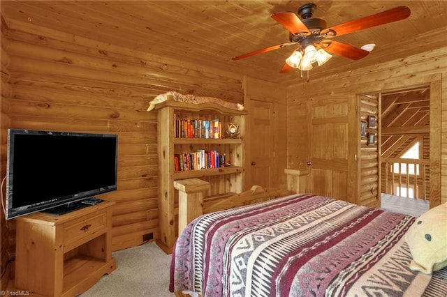 2235 Buck Mountain Rd, Purlear, NC 28665 - carpeted bedroom featuring wood ceiling, a ceiling fan, and log walls