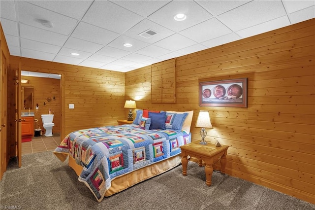 2235 Buck Mountain Rd, Purlear, NC 28665 - carpeted bedroom with recessed lighting, connected bathroom, wooden walls, and a paneled ceiling