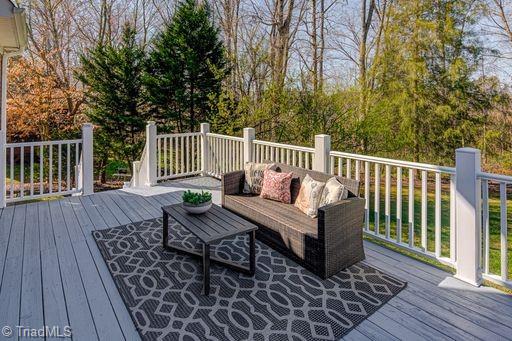 deck with an outdoor hangout area