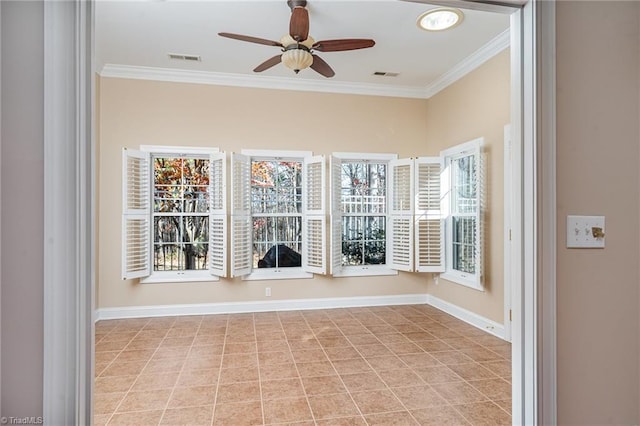 spare room featuring ceiling fan and ornamental molding