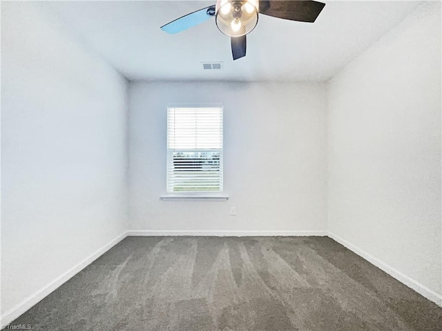 5810 Crestlawn Ct, Pfafftown, NC 27040 - spare room with carpet floors, a ceiling fan, and baseboards