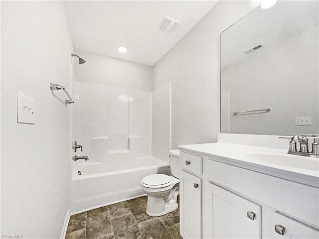 full bathroom featuring vanity, toilet, and washtub / shower combination