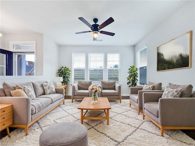 5810 Crestlawn Ct, Pfafftown, NC 27040 - living room featuring a ceiling fan, wood finished floors, and baseboards
