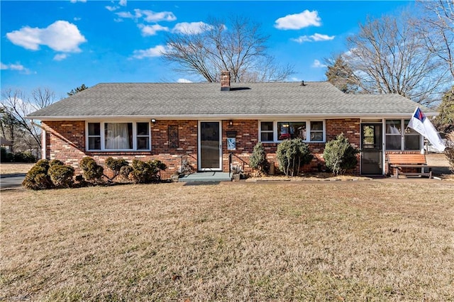 ranch-style home with a front yard