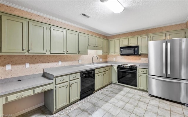 kitchen featuring sink, green cabinets, and black appliances