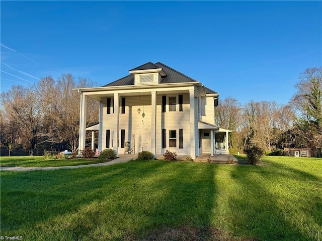 327 S Carolina Ave, Boonville, NC 27011 - greek revival inspired property featuring covered porch, a front lawn, a standing seam roof, and metal roof
