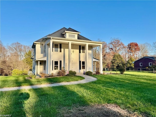 327 S Carolina Ave, Boonville, NC 27011 - neoclassical / greek revival house with a standing seam roof, metal roof, and a porch
