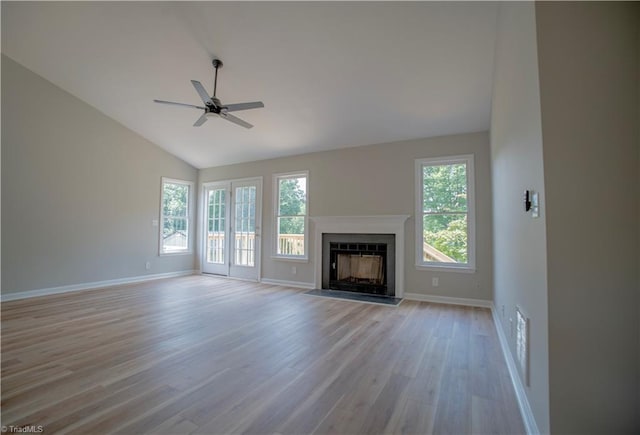 9048 Jefferson Woods Dr, King, NC 27045 - unfurnished living room with vaulted ceiling, ceiling fan, light wood-style flooring, and a fireplace