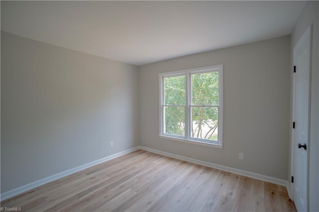 9048 Jefferson Woods Dr, King, NC 27045 - unfurnished room featuring light wood finished floors and baseboards