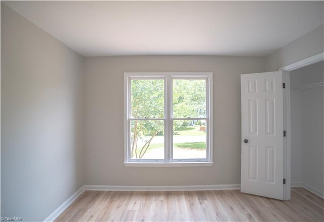 9048 Jefferson Woods Dr, King, NC 27045 - spare room featuring light wood finished floors and plenty of natural light