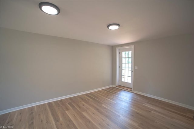 9048 Jefferson Woods Dr, King, NC 27045 - spare room with wood finished floors and baseboards
