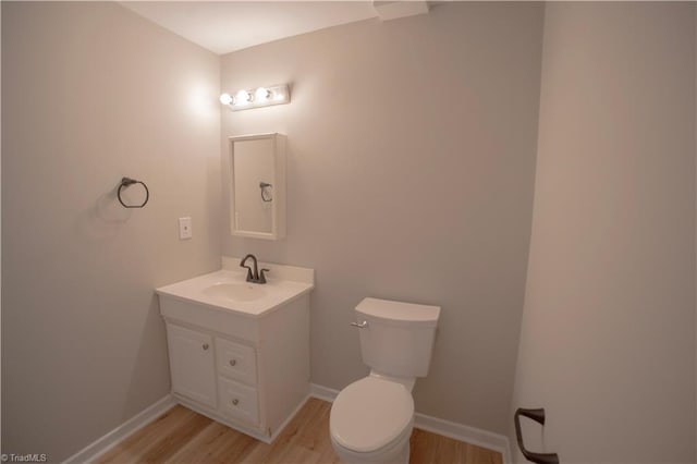 9048 Jefferson Woods Dr, King, NC 27045 - half bath featuring vanity and wood finished floors