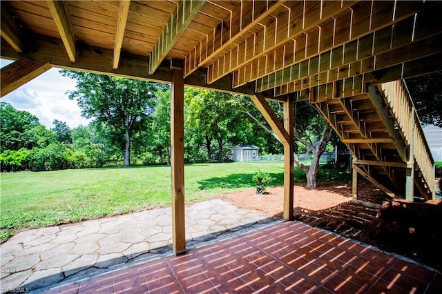 9048 Jefferson Woods Dr, King, NC 27045 - view of patio featuring a storage shed