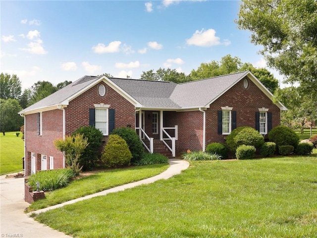 170 Deer Path Ln, Lexington, NC 27295 - view of front facade featuring brick siding, a garage, a front lawn, and driveway