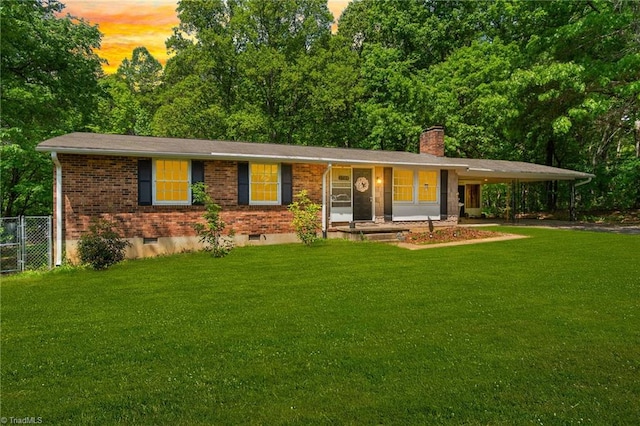 1765 K Fork Rd, Madison, NC 27025 - ranch-style house featuring brick siding, a chimney, and a carport