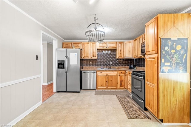 1765 K Fork Rd, Madison, NC 27025 - kitchen with appliances with stainless steel finishes, a sink, a textured ceiling, baseboards, and backsplash