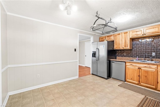 1765 K Fork Rd, Madison, NC 27025 - kitchen featuring appliances with stainless steel finishes, a sink, light floors, tasteful backsplash, and baseboards