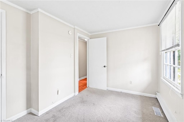 1765 K Fork Rd, Madison, NC 27025 - empty room with ornamental molding, carpet flooring, and baseboards