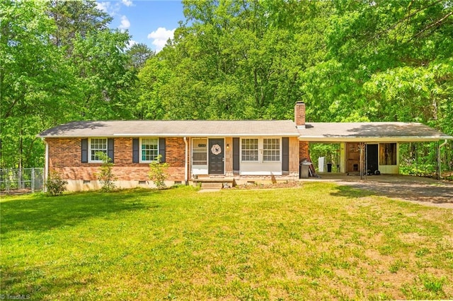 1765 K Fork Rd, Madison, NC 27025 - ranch-style home with a carport, a chimney, and brick siding