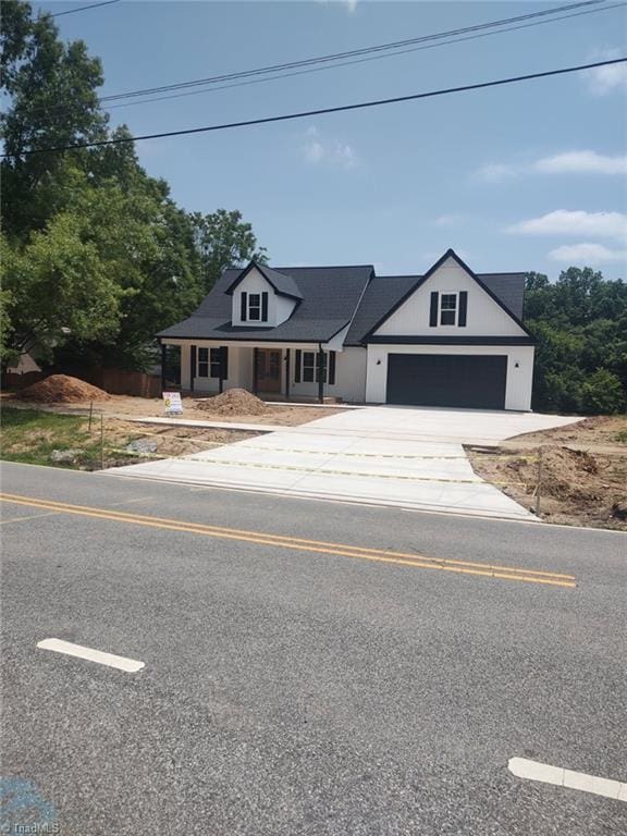 4034 Waterview Rd, High Point, NC 27265 - modern inspired farmhouse with driveway and a garage