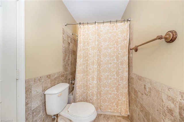 1601 Heraldry Ln, Greensboro, NC 27455 - full bath with tile walls, wainscoting, and tile patterned flooring