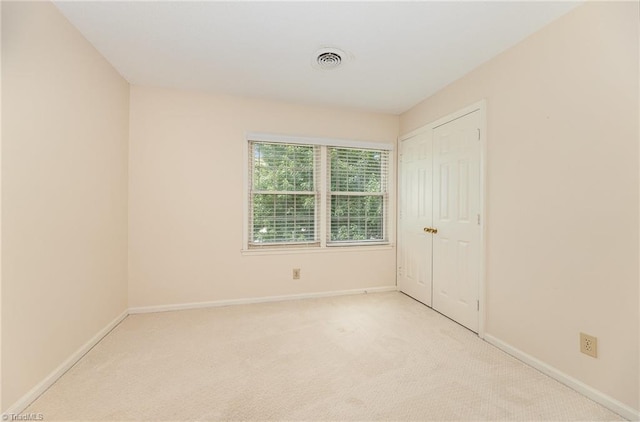 1601 Heraldry Ln, Greensboro, NC 27455 - carpeted empty room featuring baseboards