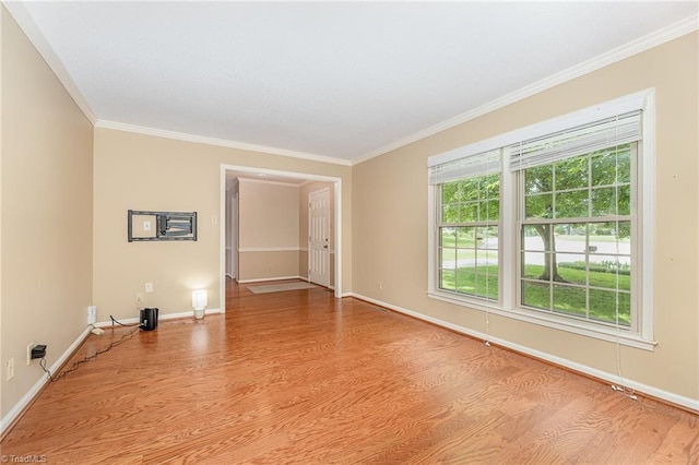 1601 Heraldry Ln, Greensboro, NC 27455 - empty room with wood finished floors and crown molding