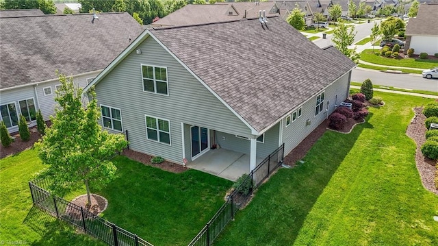 birds eye view of property with a residential view