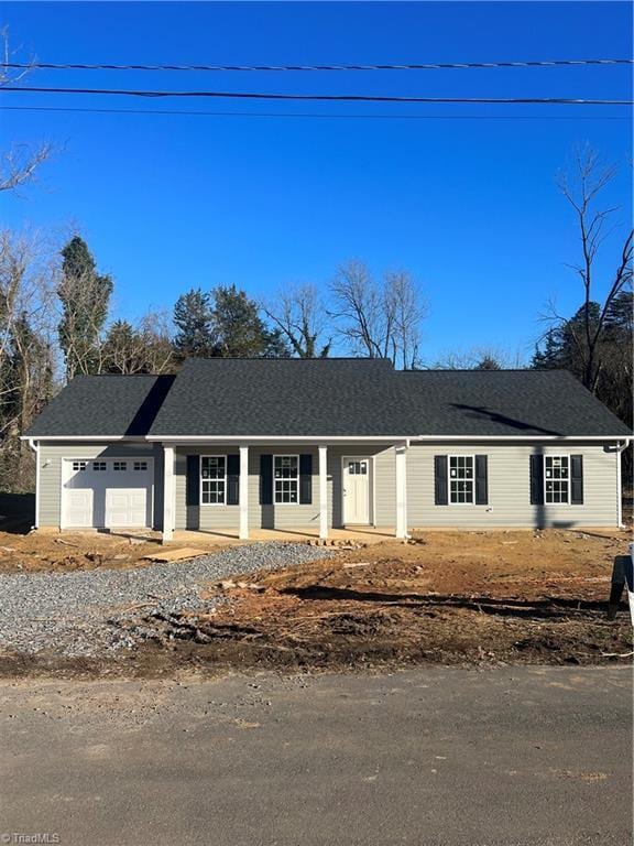 single story home with a garage