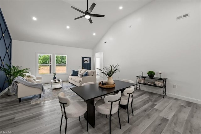7126 Whitetail Dr, Julian, NC 27283 - dining room featuring high vaulted ceiling, ceiling fan, light wood-type flooring, and visible vents
