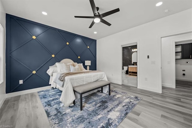 7126 Whitetail Dr, Julian, NC 27283 - bedroom with ceiling fan, ensuite bath, recessed lighting, baseboards, and light wood-type flooring