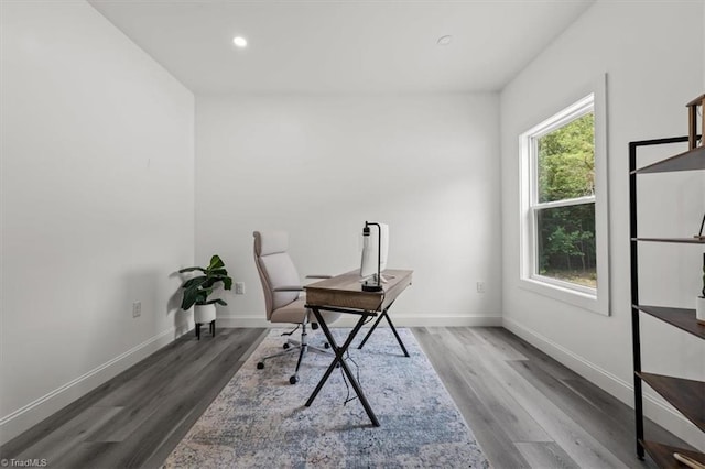 7126 Whitetail Dr, Julian, NC 27283 - office area with recessed lighting, baseboards, and wood finished floors