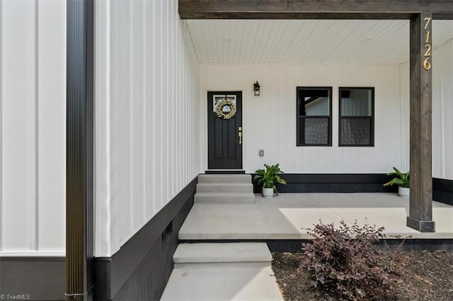 7126 Whitetail Dr, Julian, NC 27283 - doorway to property featuring covered porch
