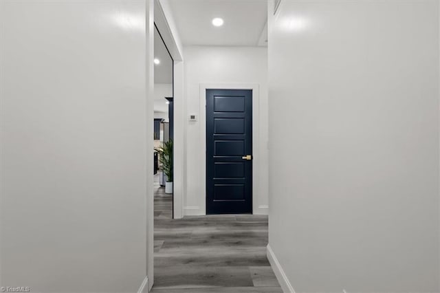 7126 Whitetail Dr, Julian, NC 27283 - hallway with baseboards, recessed lighting, and wood finished floors