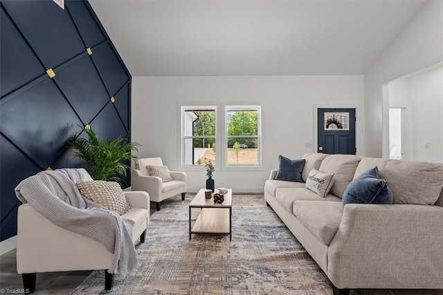 7126 Whitetail Dr, Julian, NC 27283 - living area featuring baseboards, wood finished floors, and lofted ceiling